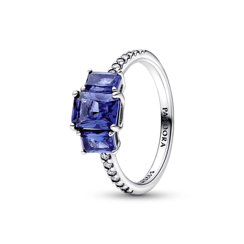 Anillo reluciente con tres piedras rectangulares azules